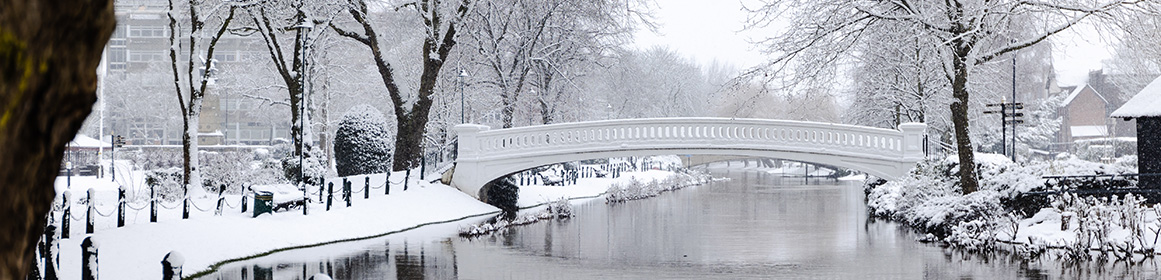 Snow covering the bridge in Victoria Park, Stafford
