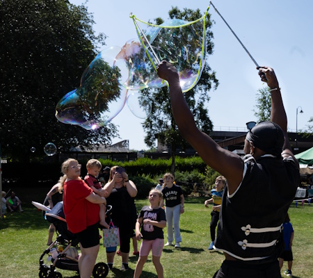 man with giant bubbles