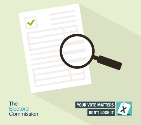 Magnifying glass over paper form - Electoral Commission - Your Vote Matters Don't Lose It