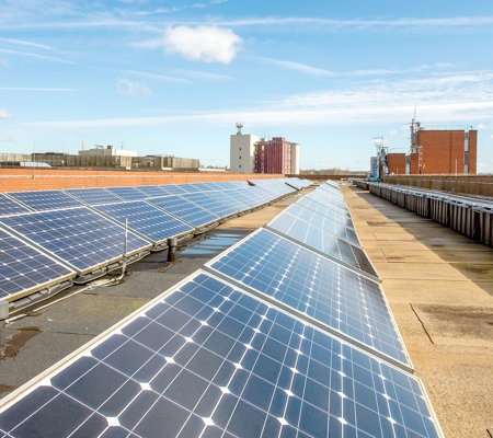 Solar panels on roof of building in Stafford
