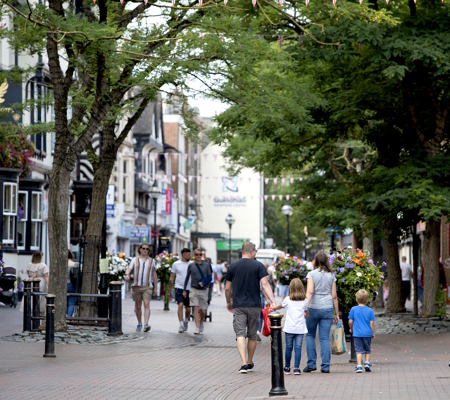 People walking through Stafford Town Centre