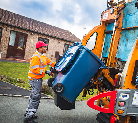 person collecting a blue bin